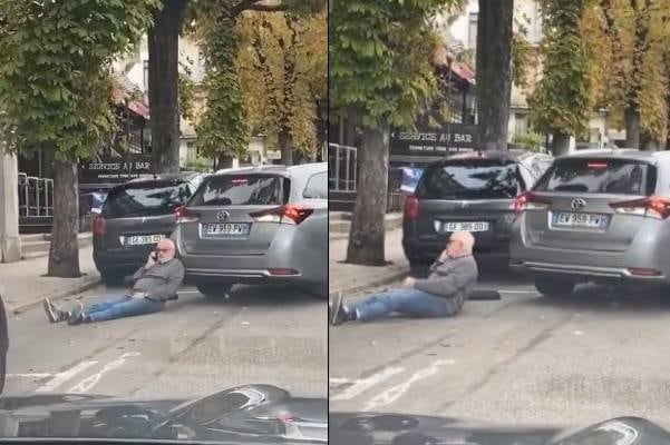 Le quiso guardar el lugar para estacionar a su amigo, se sentó en la calle, casi lo atropellan