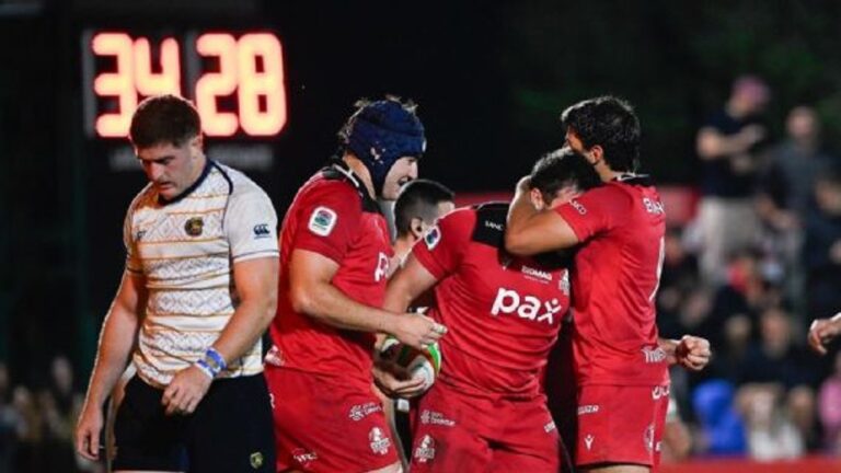 Jugadores de Dogos XV festejando un try