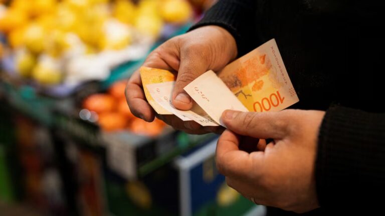 Gráfico de inflación y símbolo de porcentaje representando el IPC