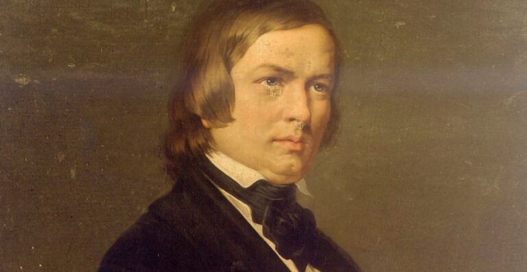 Partitura o retrato de Robert Schumann, compositor romántico alemán.