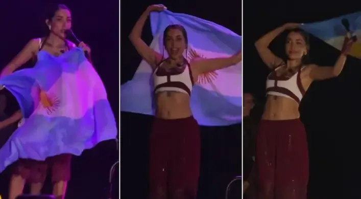 María Becerra ondeando la Bandera Argentina en el escenario del BARTS Festival de Barcelona