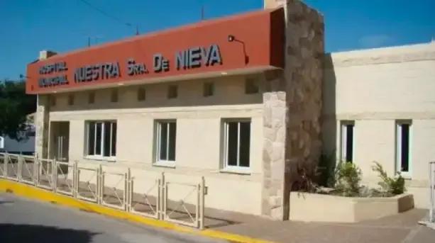 Bomberos Voluntarios de Malagueño asisten a una mujer tras explosión